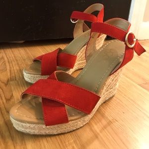 New red strap Boho wedges.
